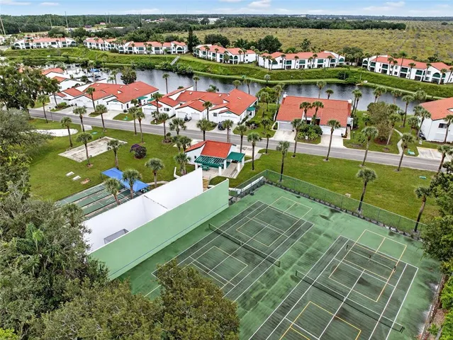 an aerial view of lake and mountain