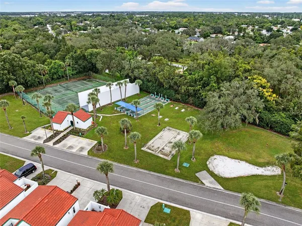 an aerial view of a house with a garden