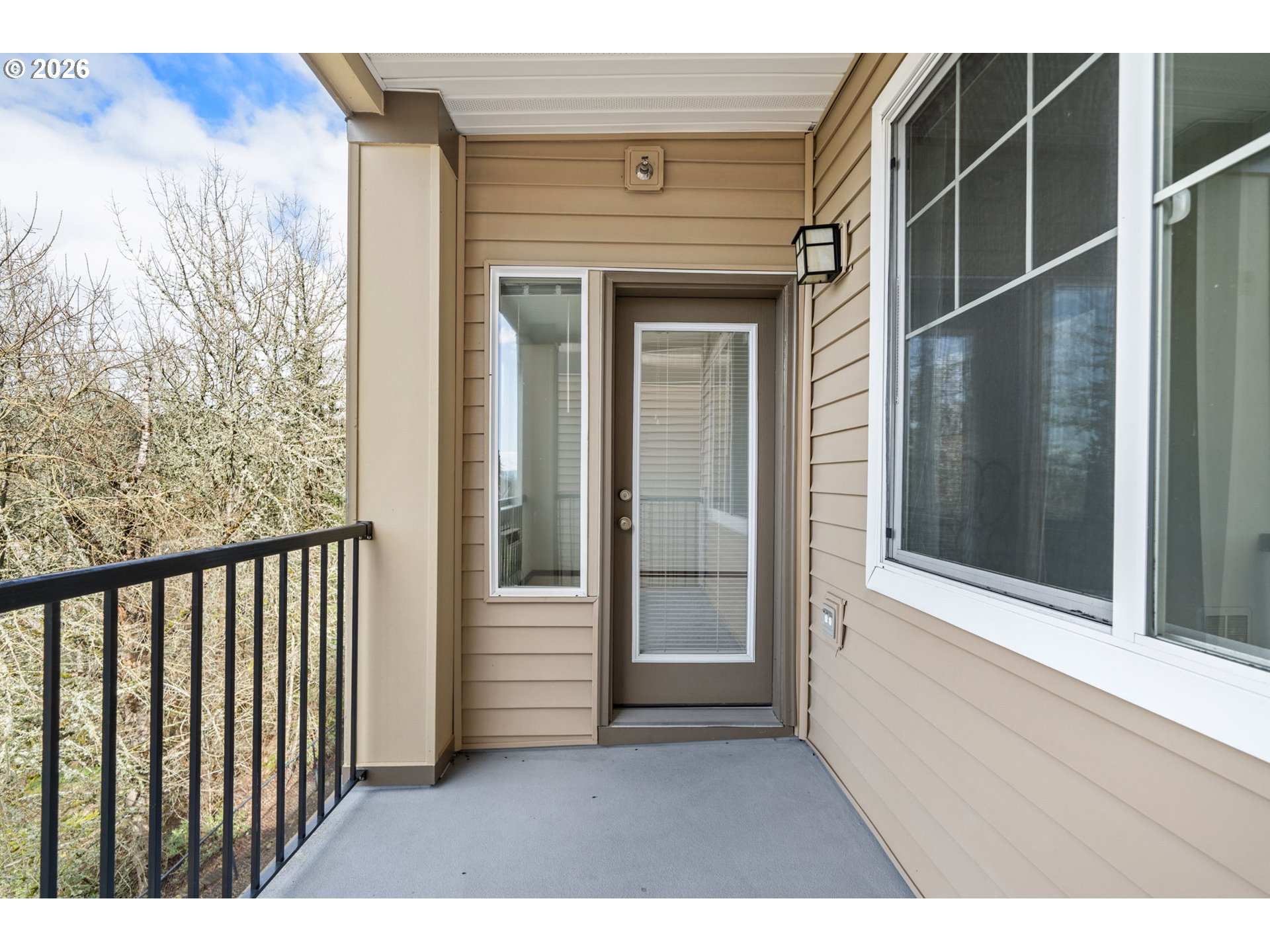 695 Northwest Falling Waters Lane, Unit 304 Portland, OR 97229 - Photo 21 of 25 a view of a balcony