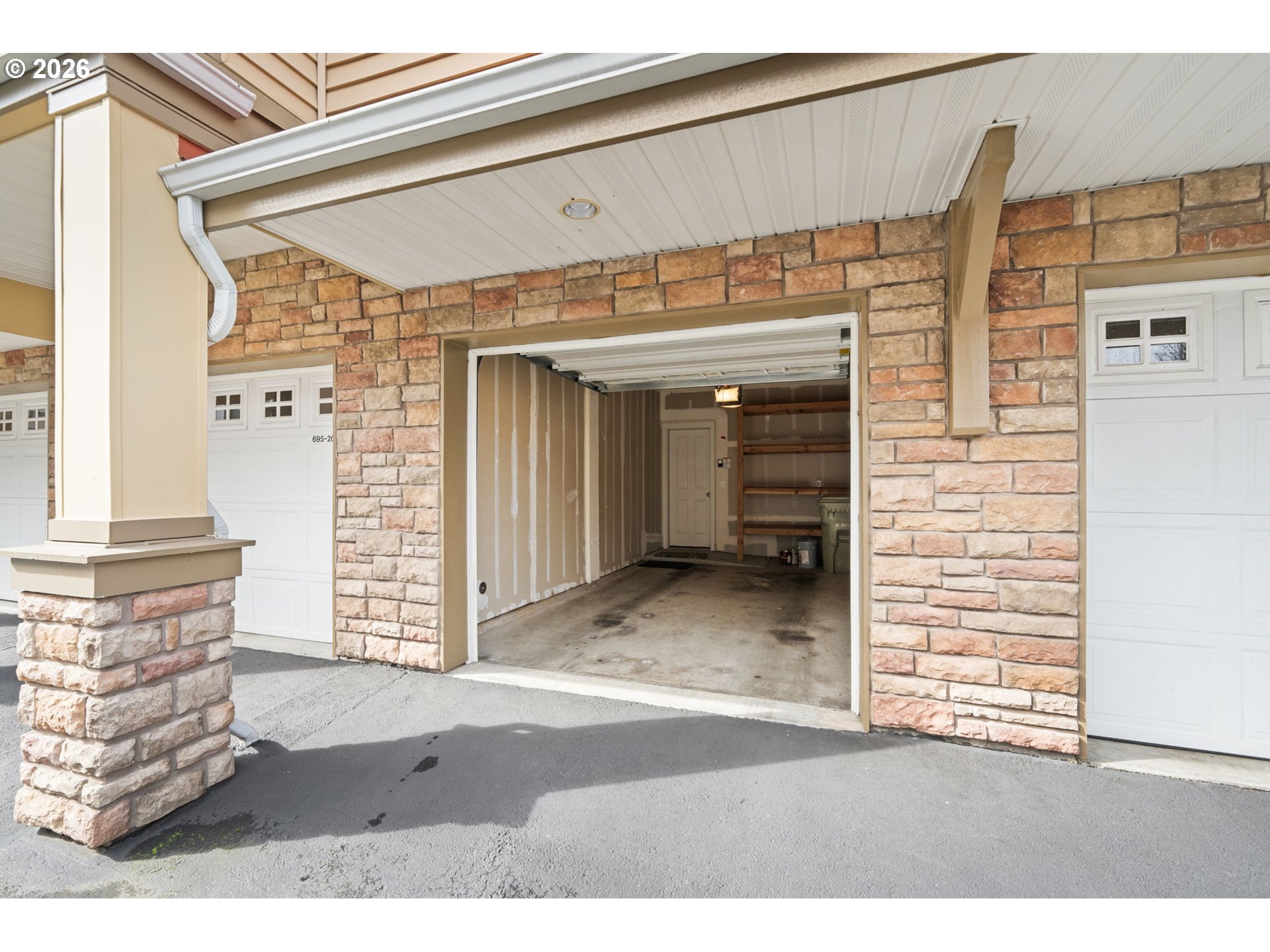 695 Northwest Falling Waters Lane, Unit 304 Portland, OR 97229 - Photo 23 of 25 a view of a entryway front of house