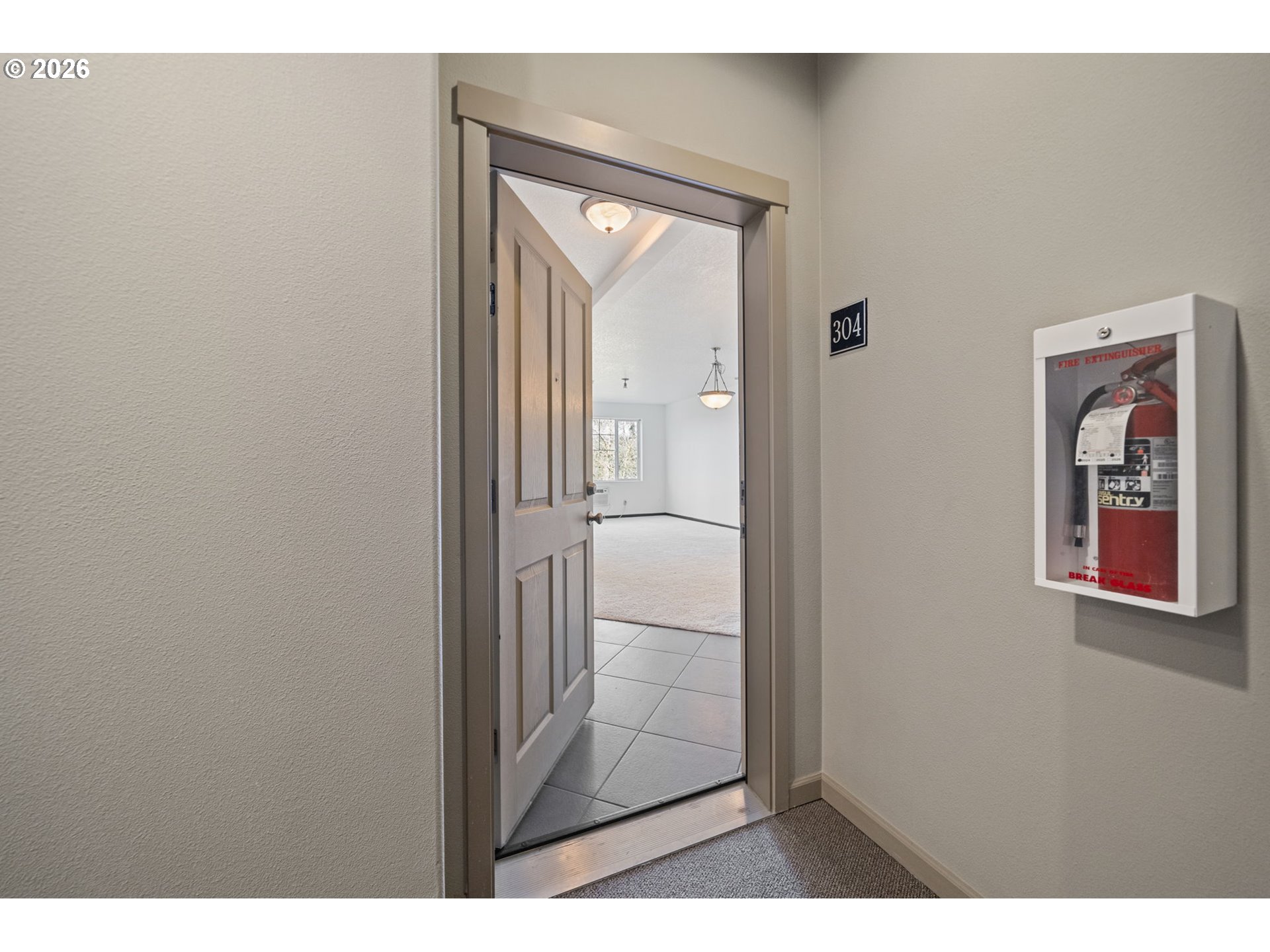 695 Northwest Falling Waters Lane, Unit 304 Portland, OR 97229 - Photo 3 of 25 a picture of a room