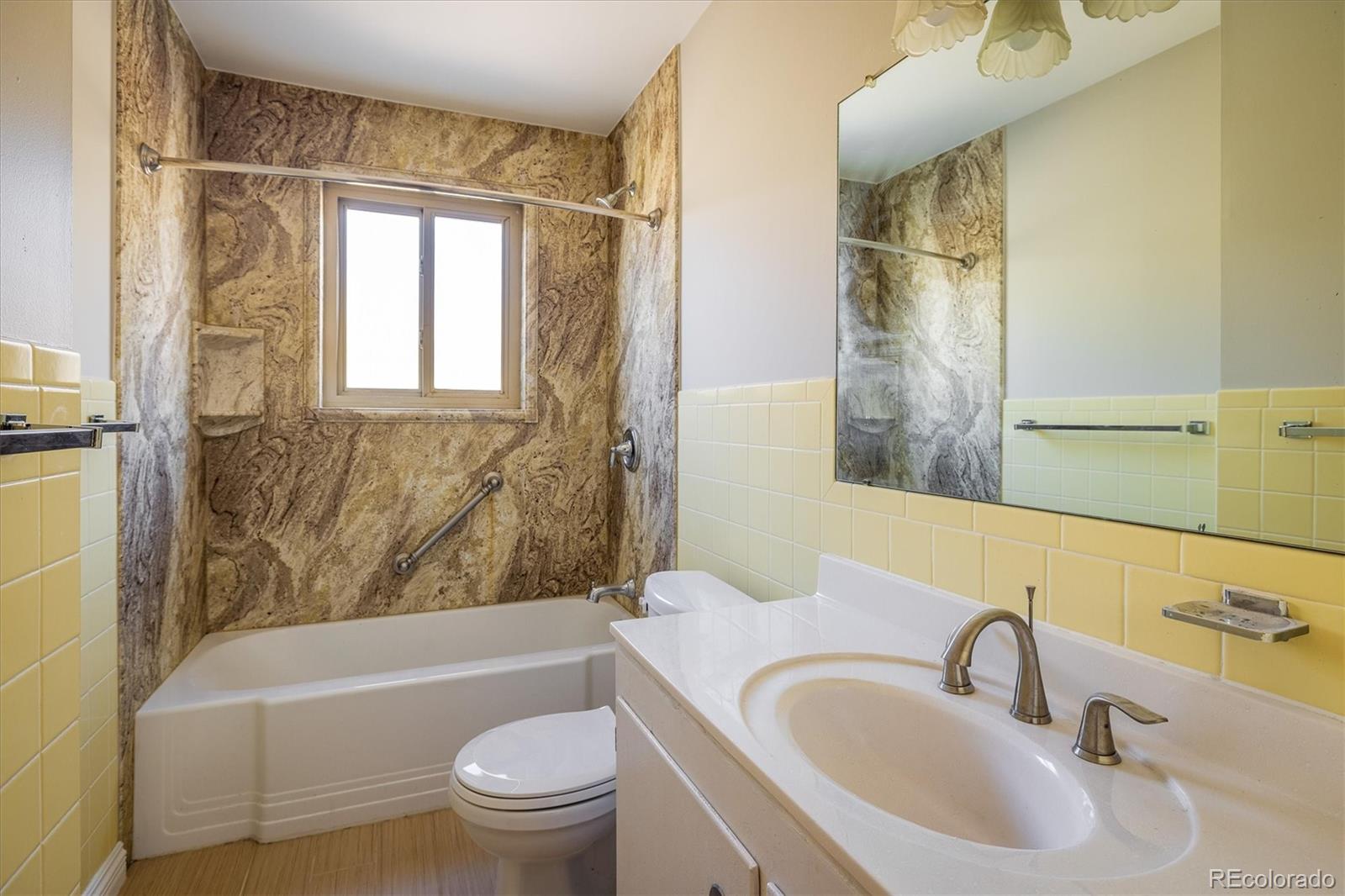 215 Lookout View Court Golden, CO 80401 - Photo 31 of 37 a bathroom with a sink toilet and shower