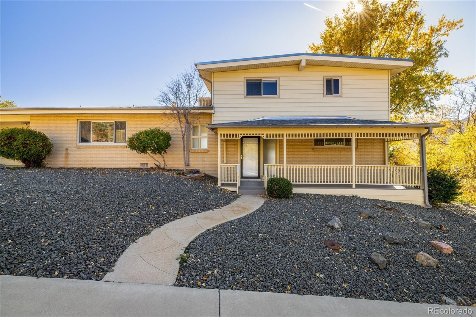 215 Lookout View Court Golden, CO 80401 - Photo 9 of 37 a front view of a house with garden