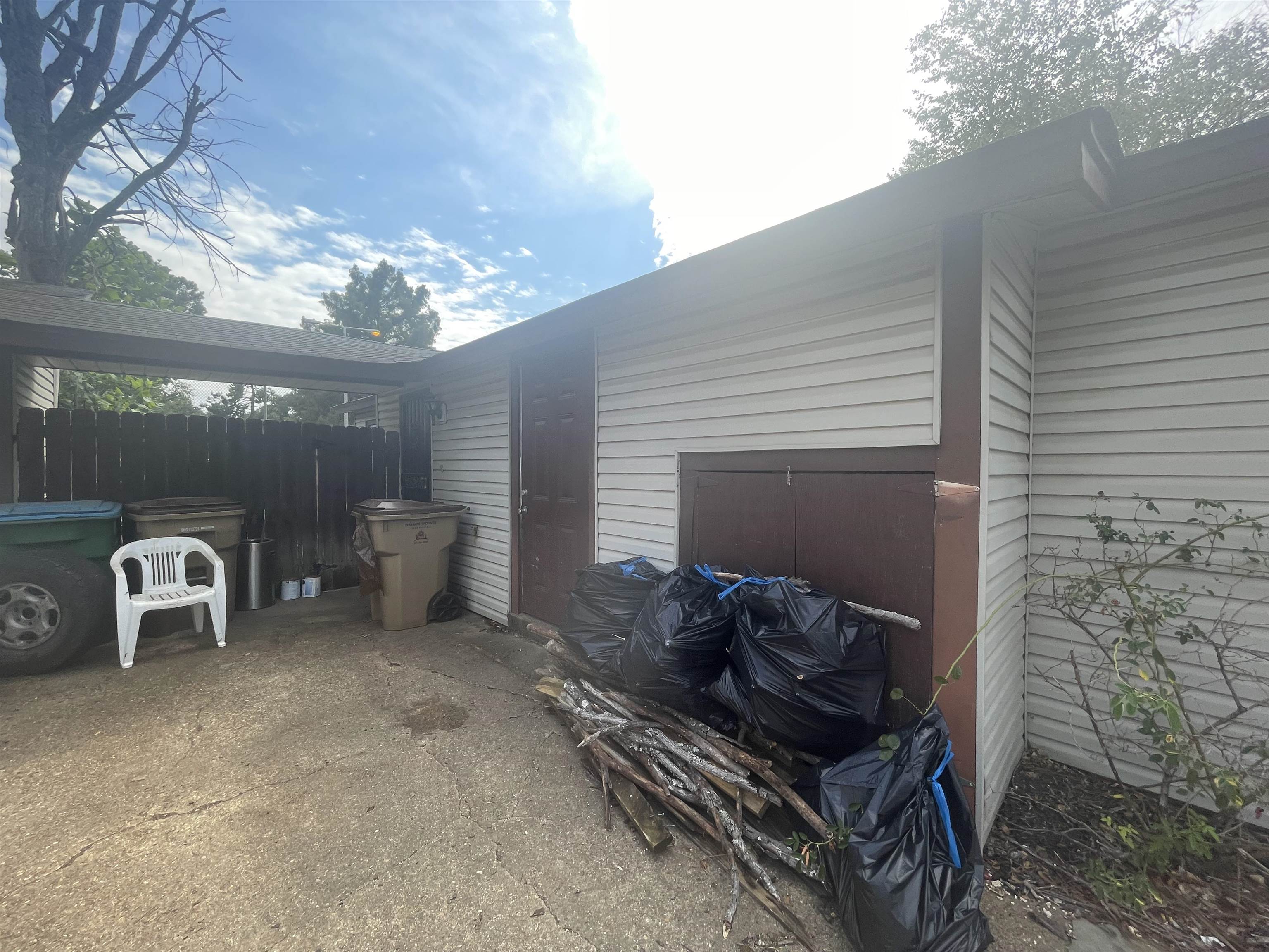 3607 Orange Blossom Court, Unit 66 Memphis, TN 38118 - Photo 4 of 4 a view of a two chairs in the patio