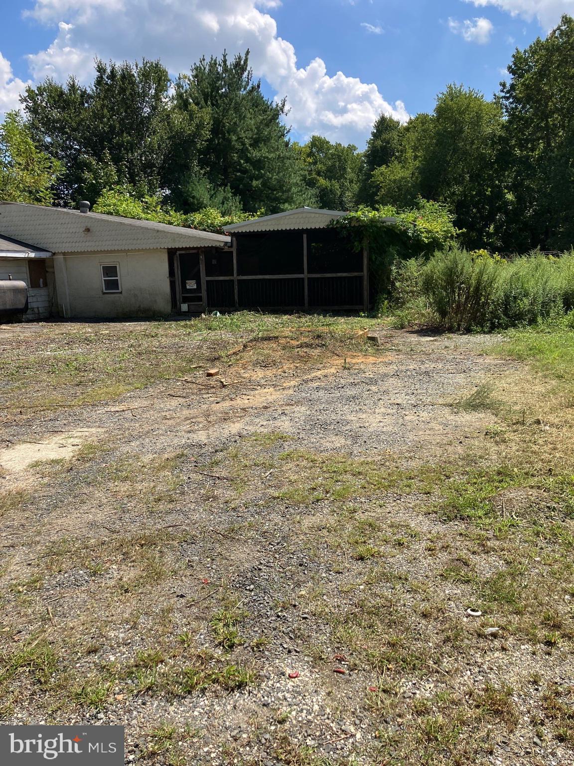 41 New Bridge Road Quinton, NJ 08079 - Photo 3 of 19 a backyard of a house with lots of green space