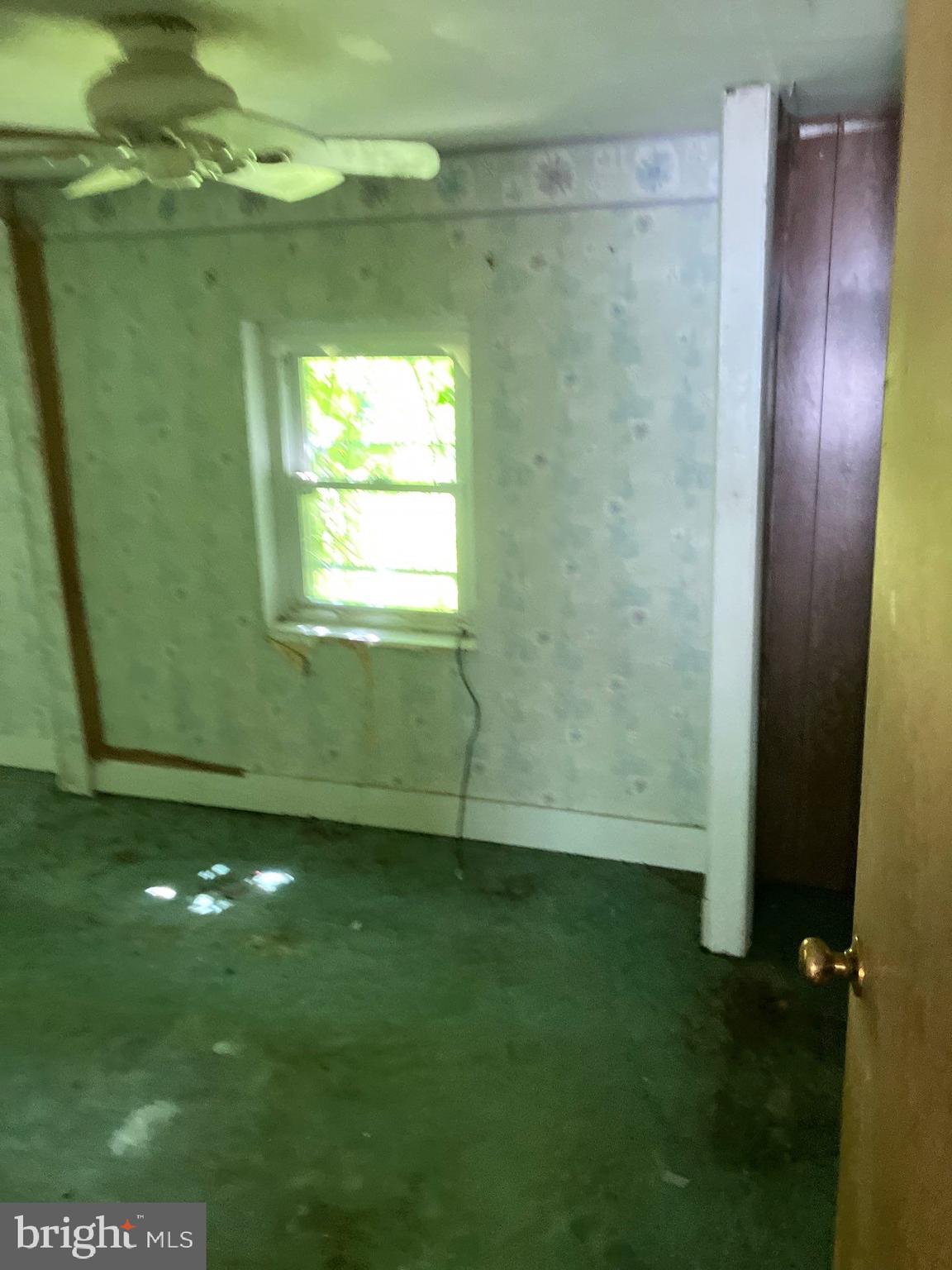 41 New Bridge Road Quinton, NJ 08079 - Photo 7 of 19 a view of a livingroom with a window