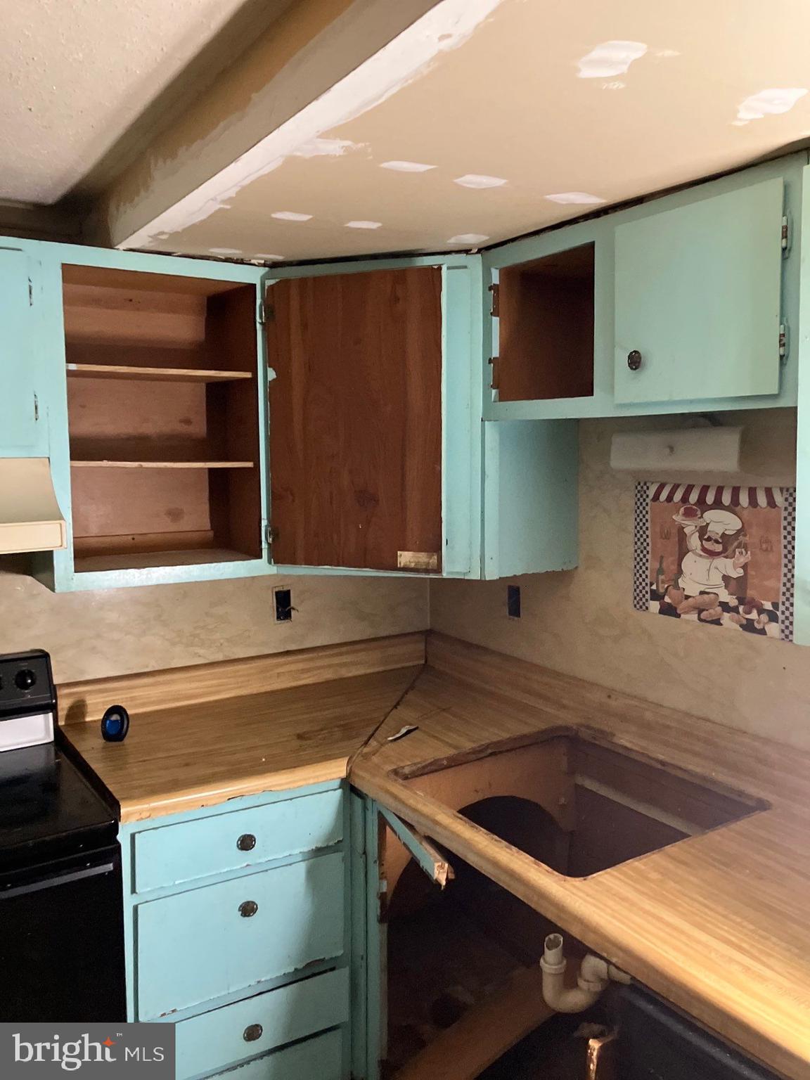 41 New Bridge Road Quinton, NJ 08079 - Photo 10 of 19 a kitchen with a sink cabinets and window