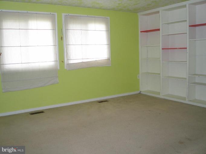 2306 Whitetail Court Reston, VA 20191 - Photo 5 of 8 a view of an empty room with a window