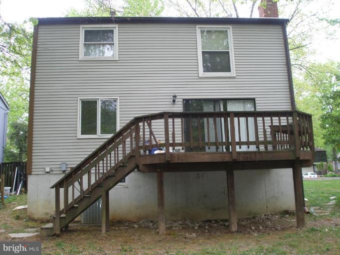 2306 Whitetail Court Reston, VA 20191 - Photo 8 of 8 a view of a house with a deck