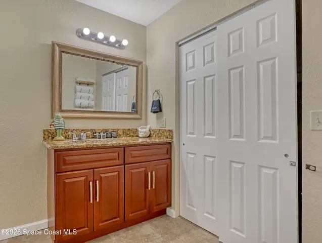 a view of a hallway with mirror