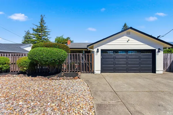 a view of a house with a garage