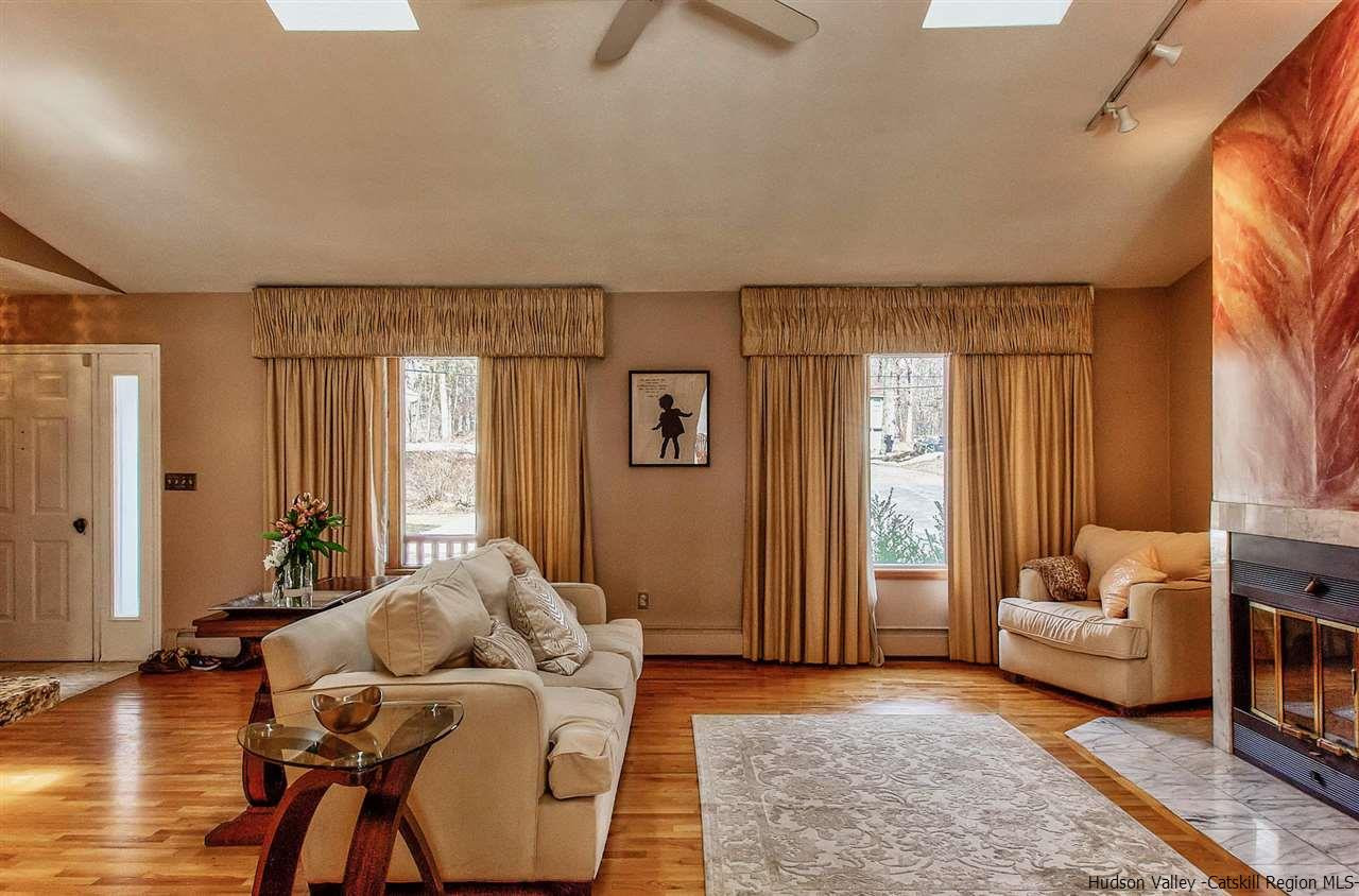 417 Red Top Road Highland, NY 12528 - Photo 8 of 35 a living room with furniture and a large window