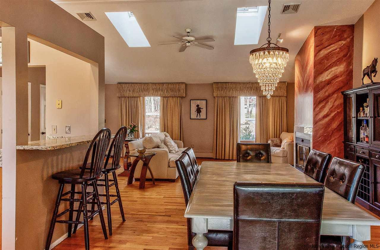 417 Red Top Road Highland, NY 12528 - Photo 9 of 35 a view of a dining room with furniture and chandelier