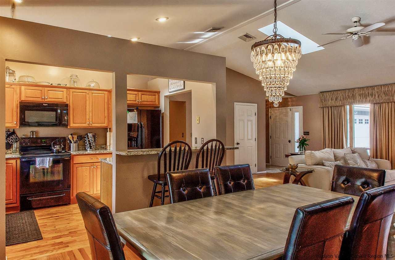 417 Red Top Road Highland, NY 12528 - Photo 10 of 35 a large kitchen with a table and chairs