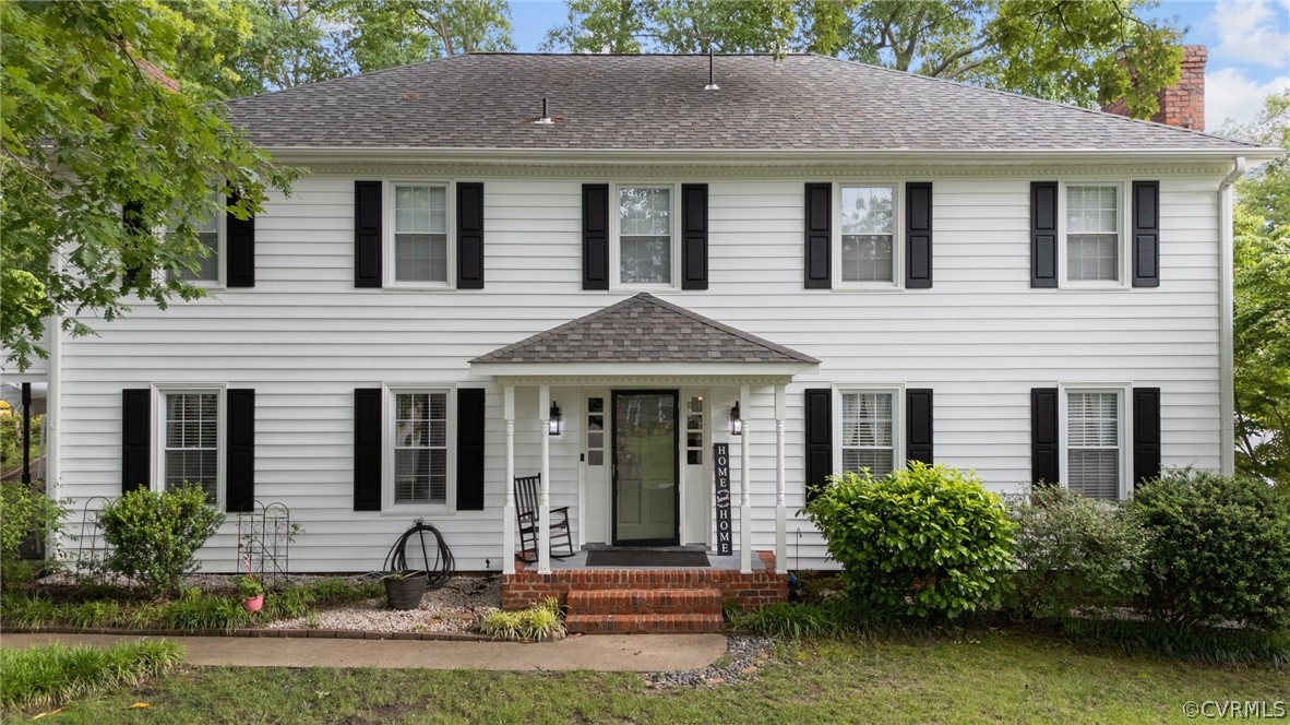 3905 Cresthill Road Chester, VA 23831 - Photo 2 of 49 a front view of a house with garden and plants