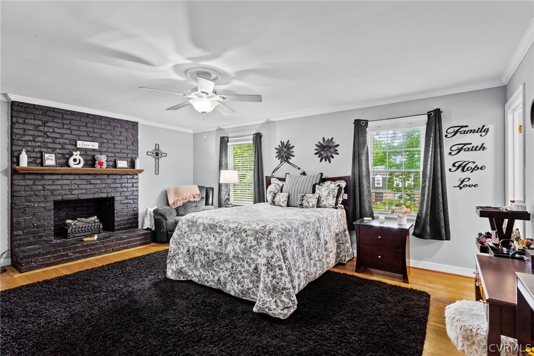 3905 Cresthill Road Chester, VA 23831 - Photo 22 of 49 a bed room with a bed and a fireplace