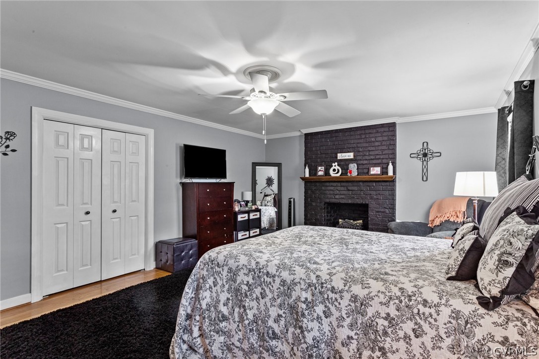 3905 Cresthill Road Chester, VA 23831 - Photo 24 of 49 a bedroom with a bed and a flat screen tv