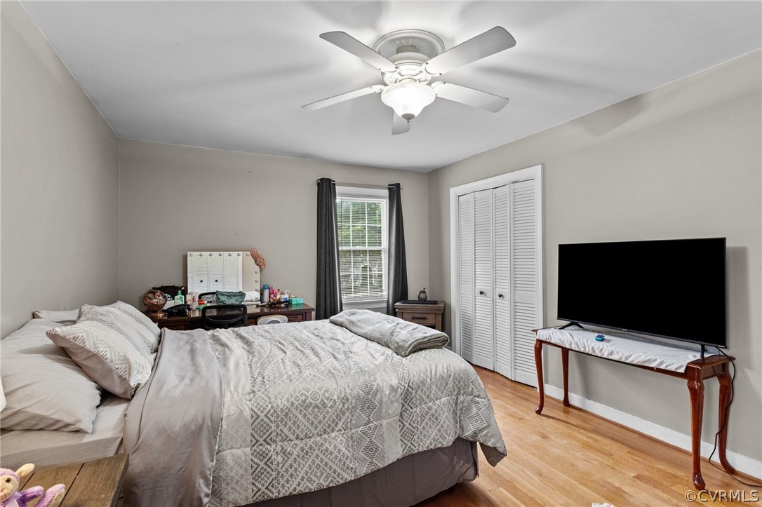 3905 Cresthill Road Chester, VA 23831 - Photo 27 of 49 a bedroom with a bed and a flat screen tv