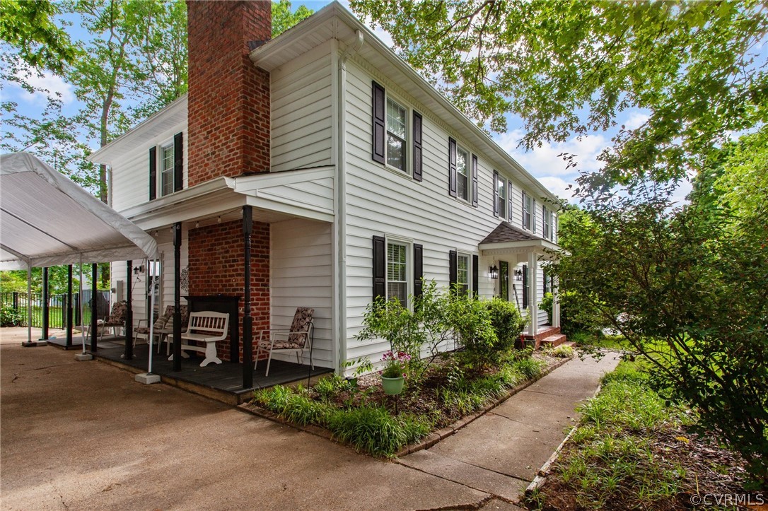 3905 Cresthill Road Chester, VA 23831 - Photo 47 of 49 a front view of a house with a yard