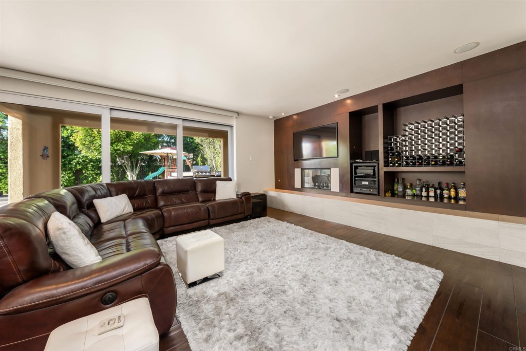 1931 Corte Cantante Chula Vista, CA 91914 - Photo 20 of 61 a living room with furniture and a wooden floor
