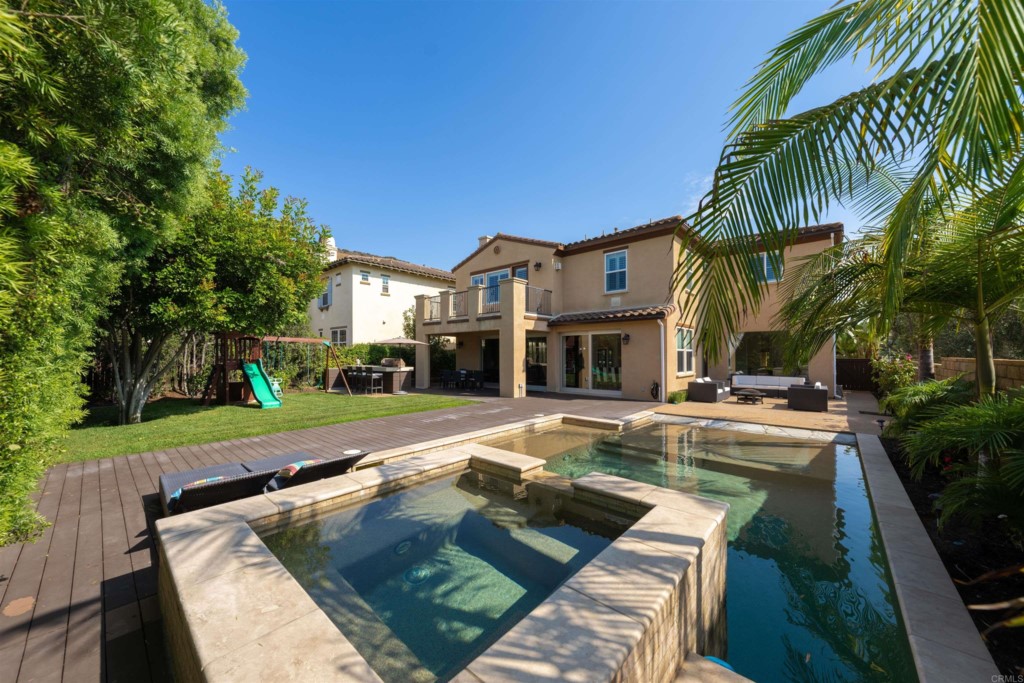 1931 Corte Cantante Chula Vista, CA 91914 - Photo 50 of 61 a view of a house with swimming pool and sitting area