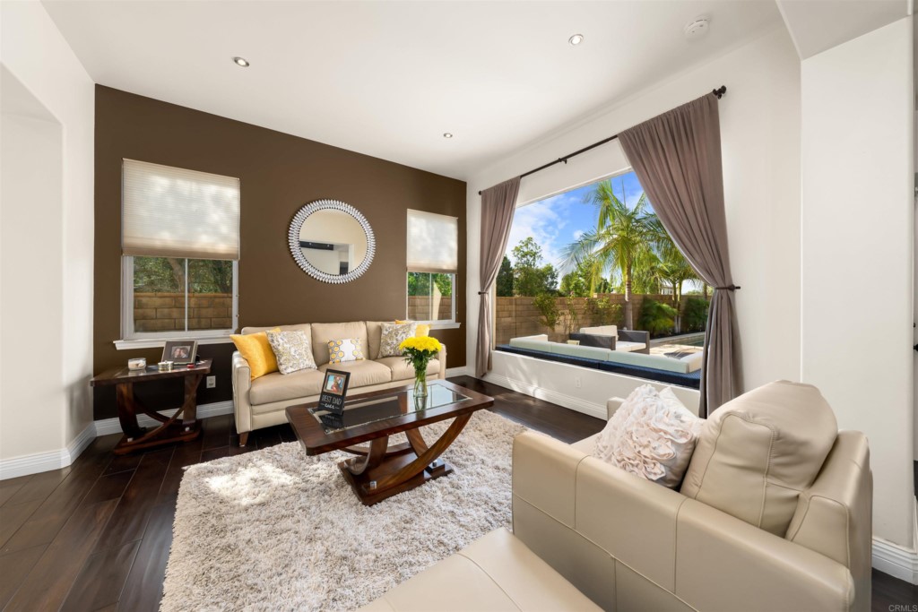 1931 Corte Cantante Chula Vista, CA 91914 - Photo 10 of 61 a living room with furniture and a large window