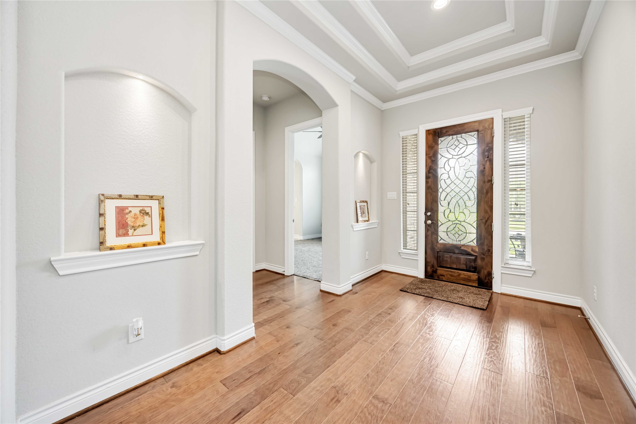 5202 Creekmore Circle Spring, TX 77389 - Photo 4 of 24 an empty room with wooden floor and windows