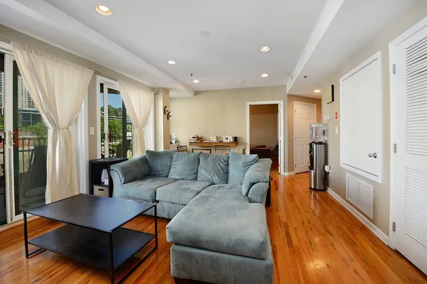 a living room with furniture and a table