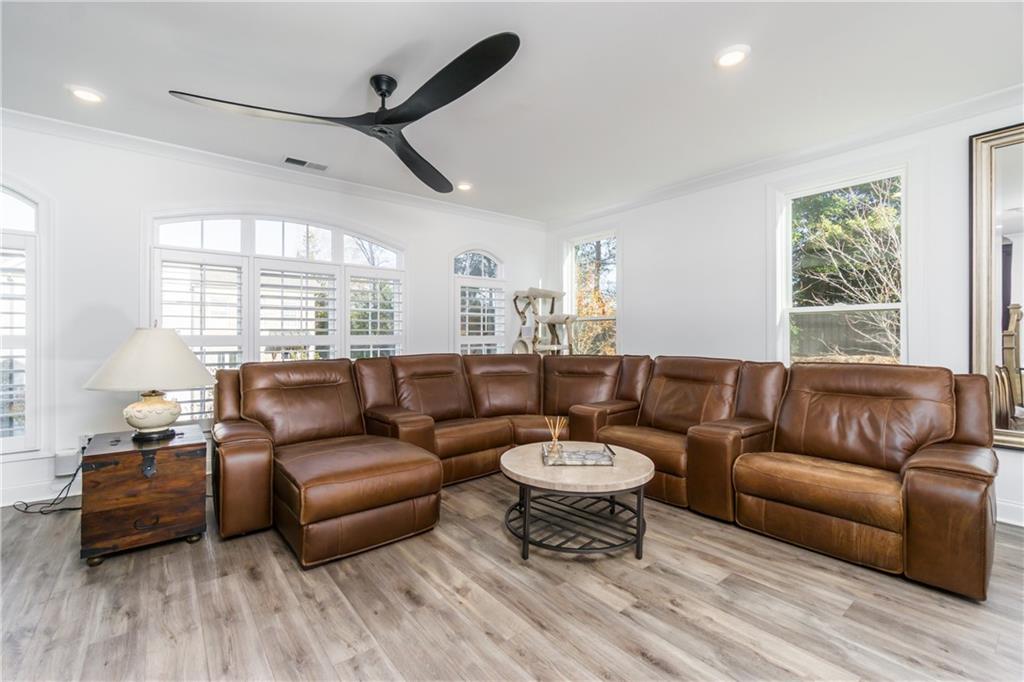 3106 Moor View Road Duluth, GA 30096 - Photo 14 of 39 a living room with furniture and a large window