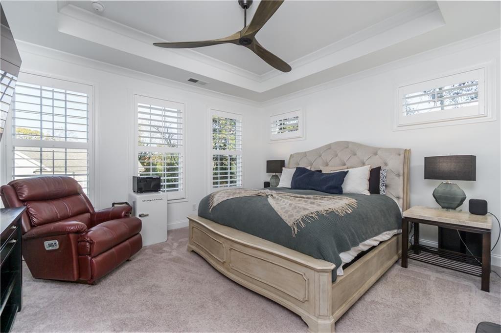 3106 Moor View Road Duluth, GA 30096 - Photo 19 of 39 a spacious bedroom with a bed and glass window