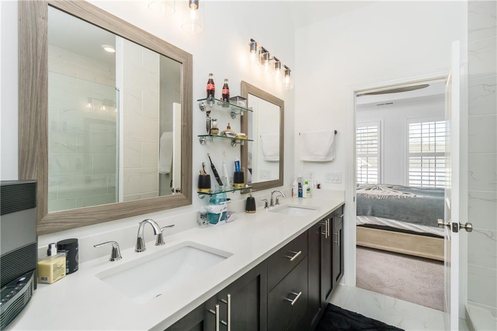 3106 Moor View Road Duluth, GA 30096 - Photo 23 of 39 a bathroom with a double vanity sink mirror double and