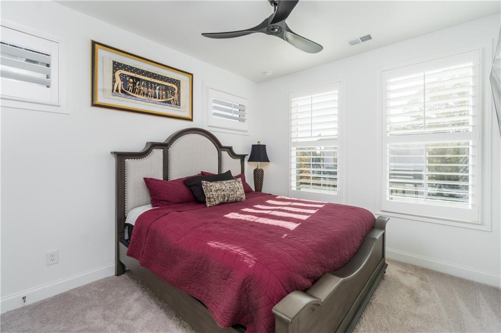 3106 Moor View Road Duluth, GA 30096 - Photo 25 of 39 a bedroom with a bed and a window