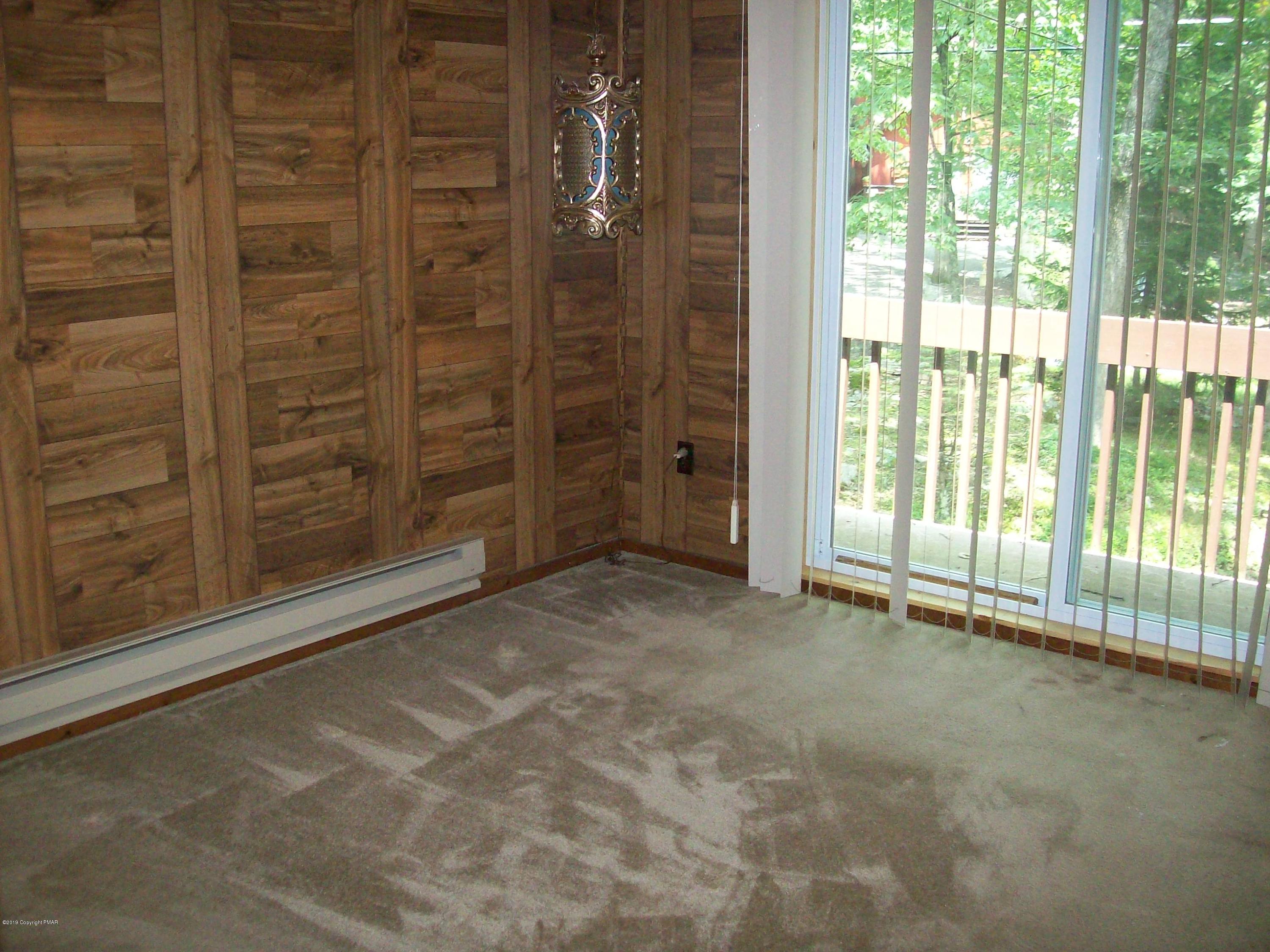 243 Canterbury Road Bushkill, PA 18324 - Photo 15 of 29 a view of an empty room with a window