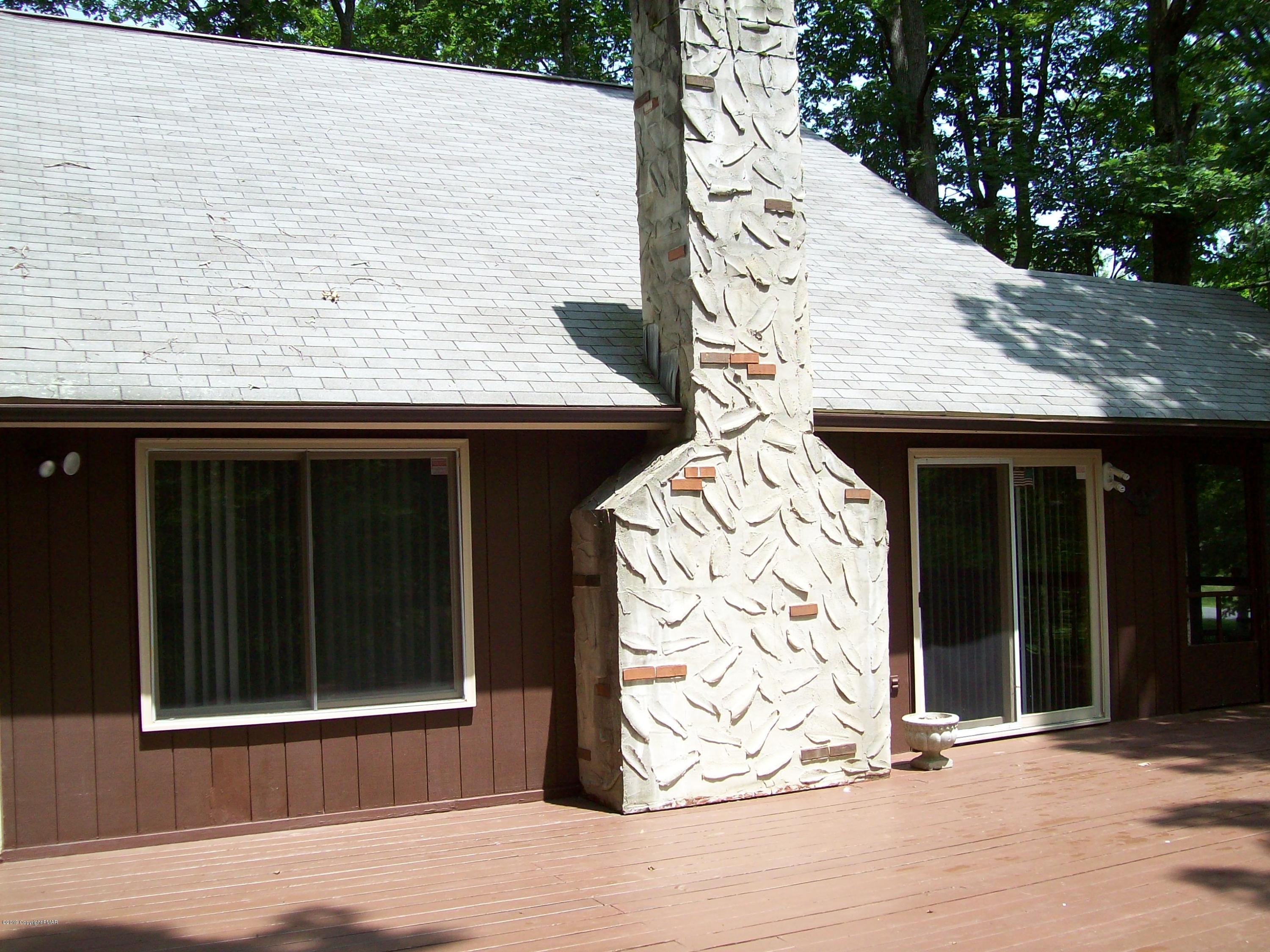 243 Canterbury Road Bushkill, PA 18324 - Photo 27 of 29 a view of a entryway door front of house
