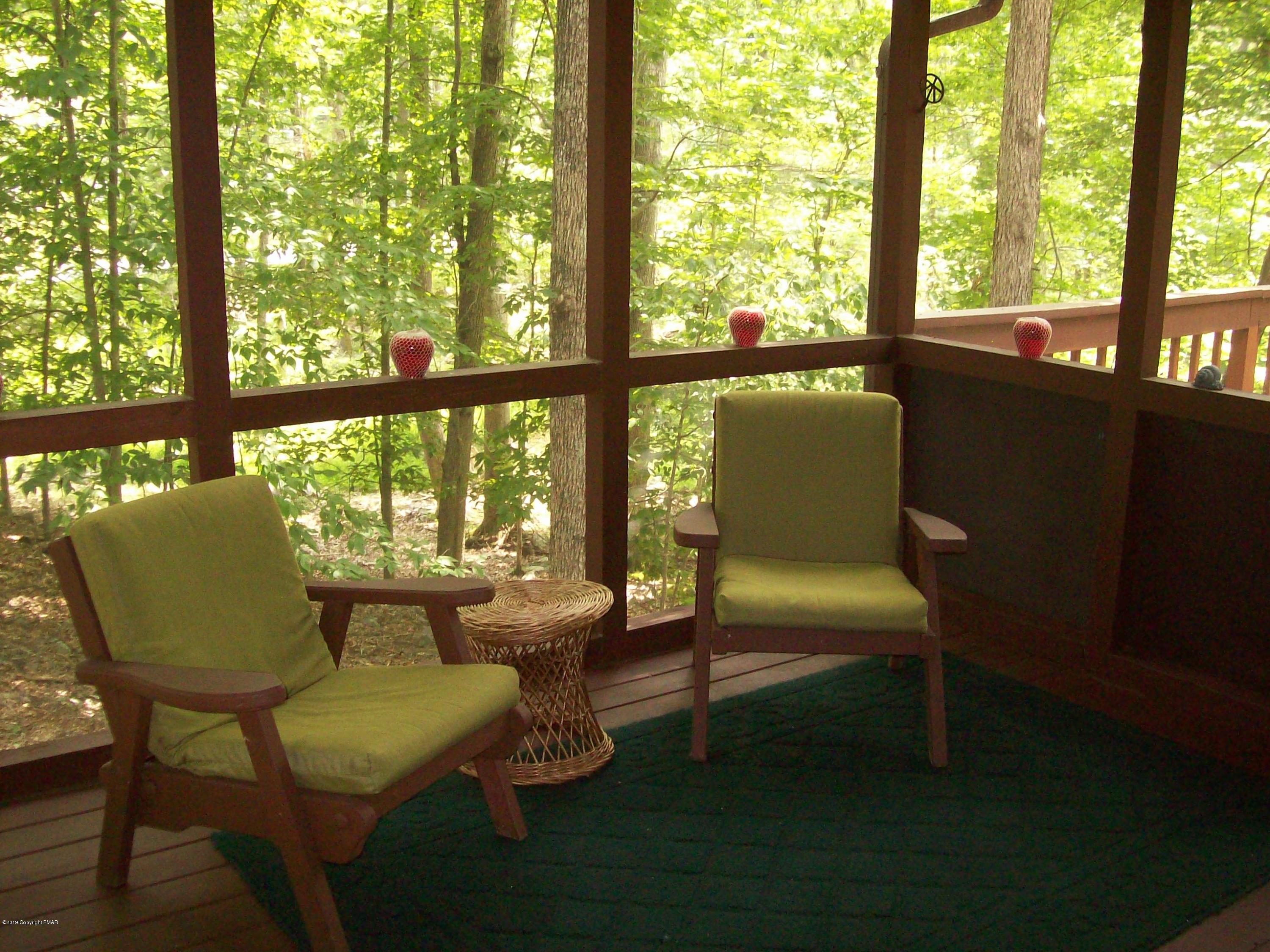 243 Canterbury Road Bushkill, PA 18324 - Photo 29 of 29 a balcony with chairs and city view