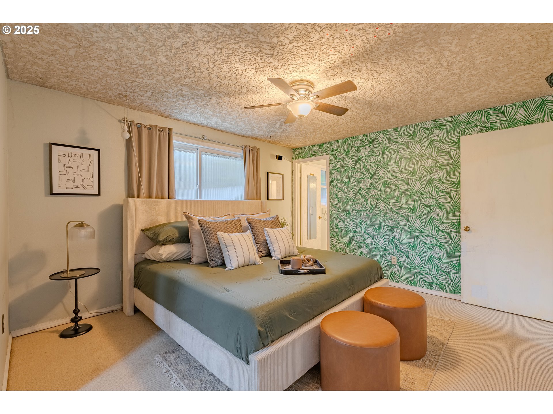 3270 Northwest Ivy Lane Camas, WA 98607 - Photo 14 of 26 a bedroom with a bed and a chandelier