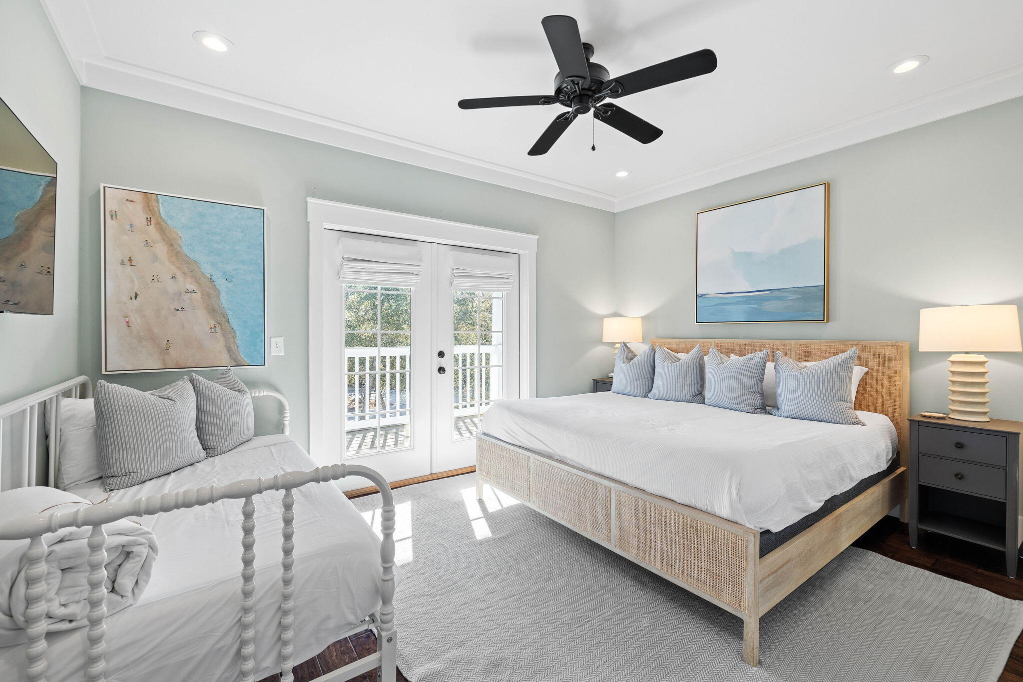 131 Clareon Drive Inlet Beach, FL 32461 - Photo 21 of 62 a bedroom with a large bed and a couch