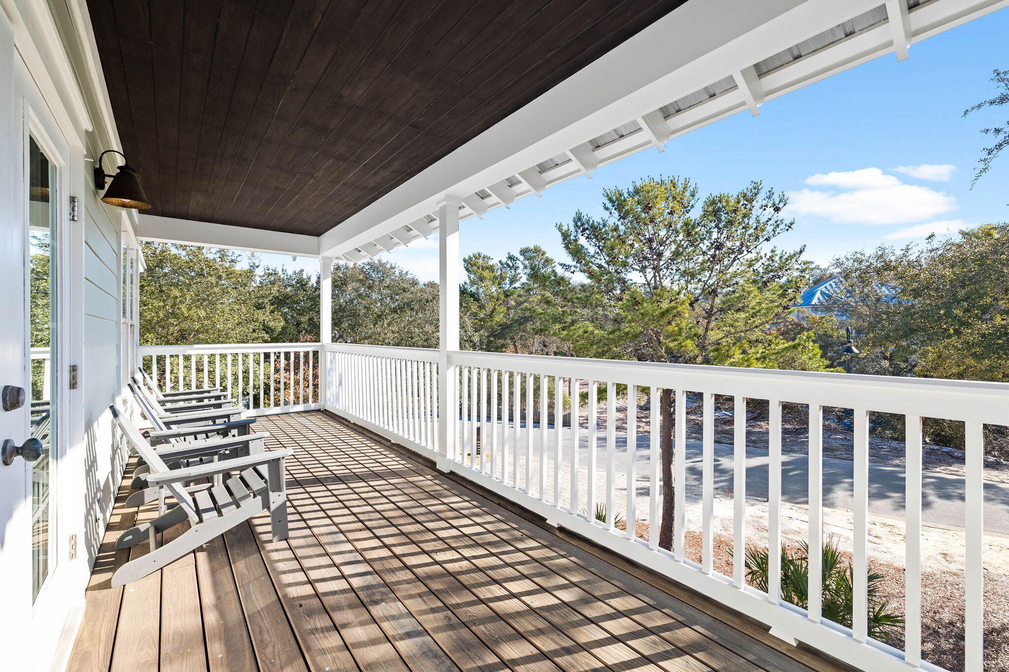 131 Clareon Drive Inlet Beach, FL 32461 - Photo 23 of 62 a balcony with wooden floor