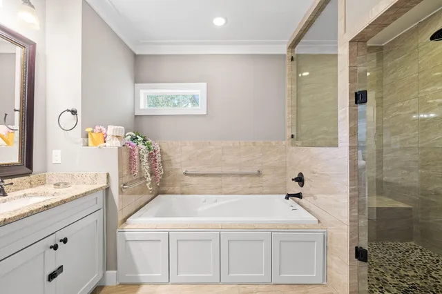 a view of a patio with a dining table and chairs