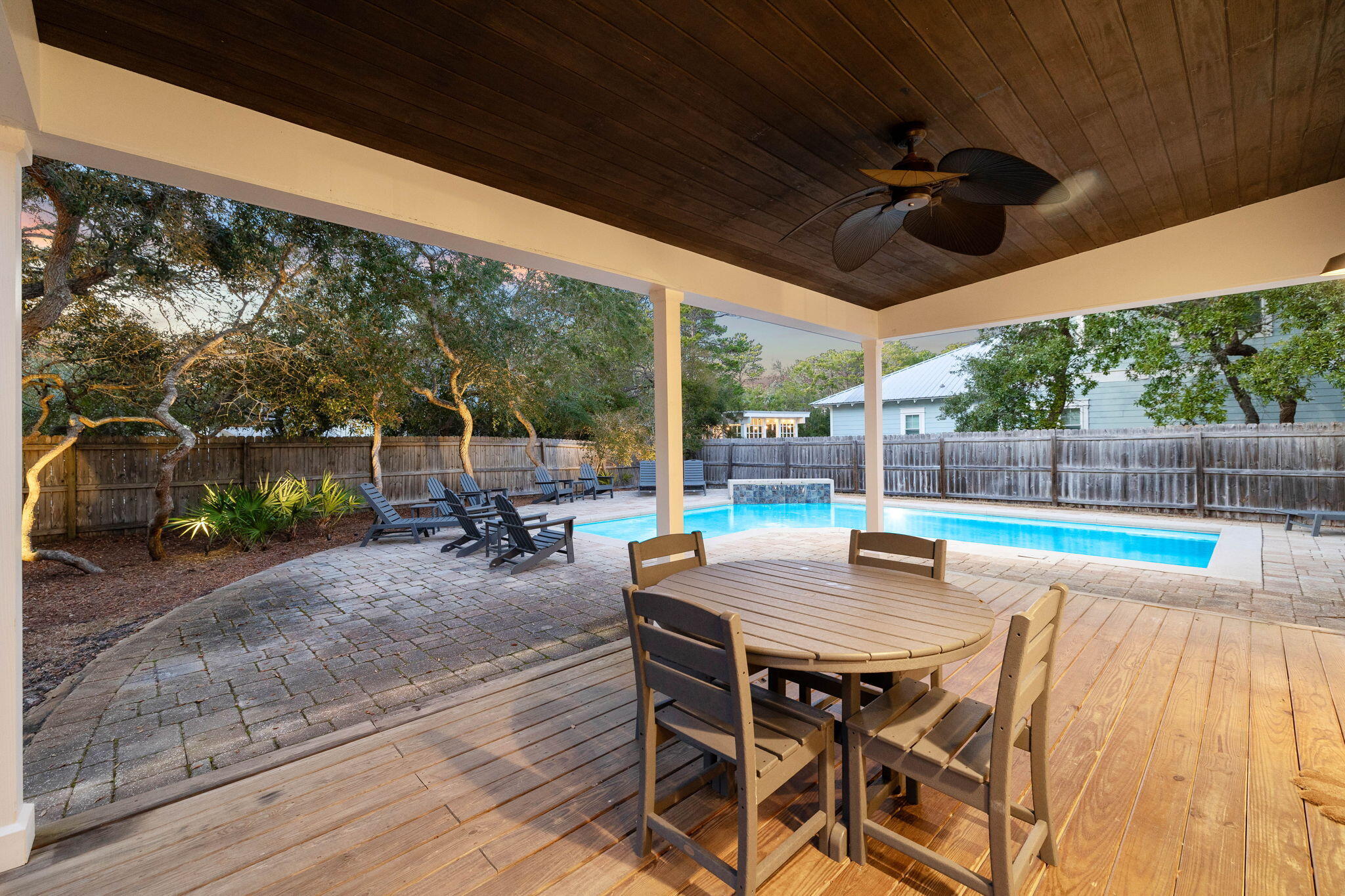 131 Clareon Drive Inlet Beach, FL 32461 - Photo 50 of 62 a view of a patio with a dining table and chairs