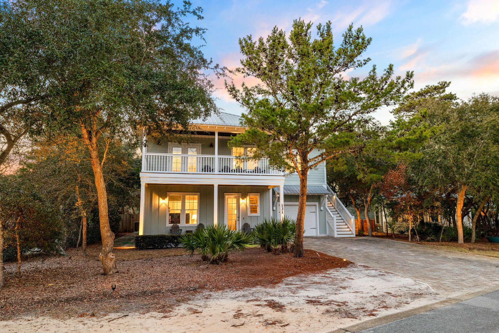 131 Clareon Drive Inlet Beach, FL 32461 - Photo 61 of 62 a front view of a house with garden