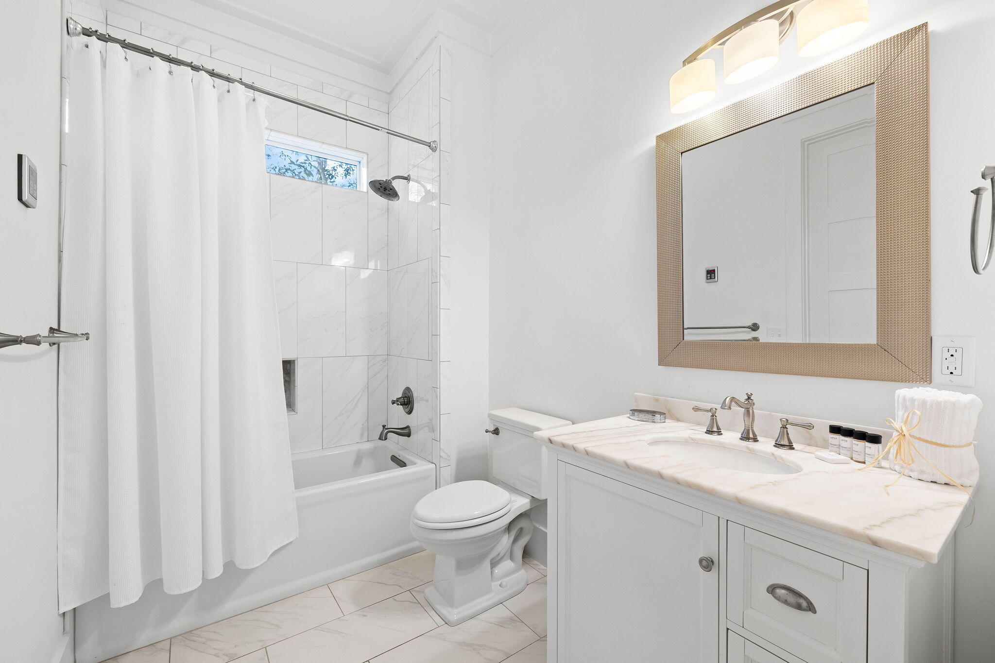 131 Clareon Drive Inlet Beach, FL 32461 - Photo 9 of 62 a bathroom with a sink a toilet and shower