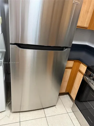 a kitchen with a stove and a microwave