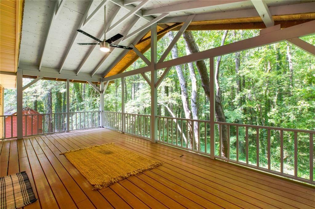 6464 Westerly Way Douglasville, GA 30135 - Photo 15 of 40 a view of porch with wooden floor