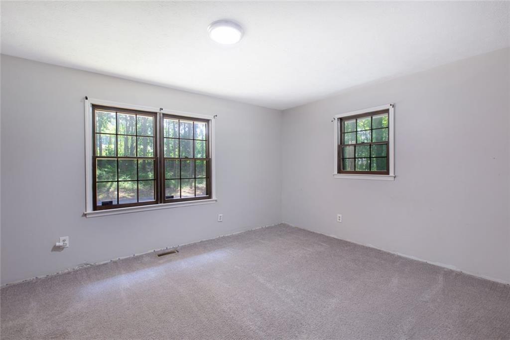 6464 Westerly Way Douglasville, GA 30135 - Photo 17 of 40 an empty room with a window