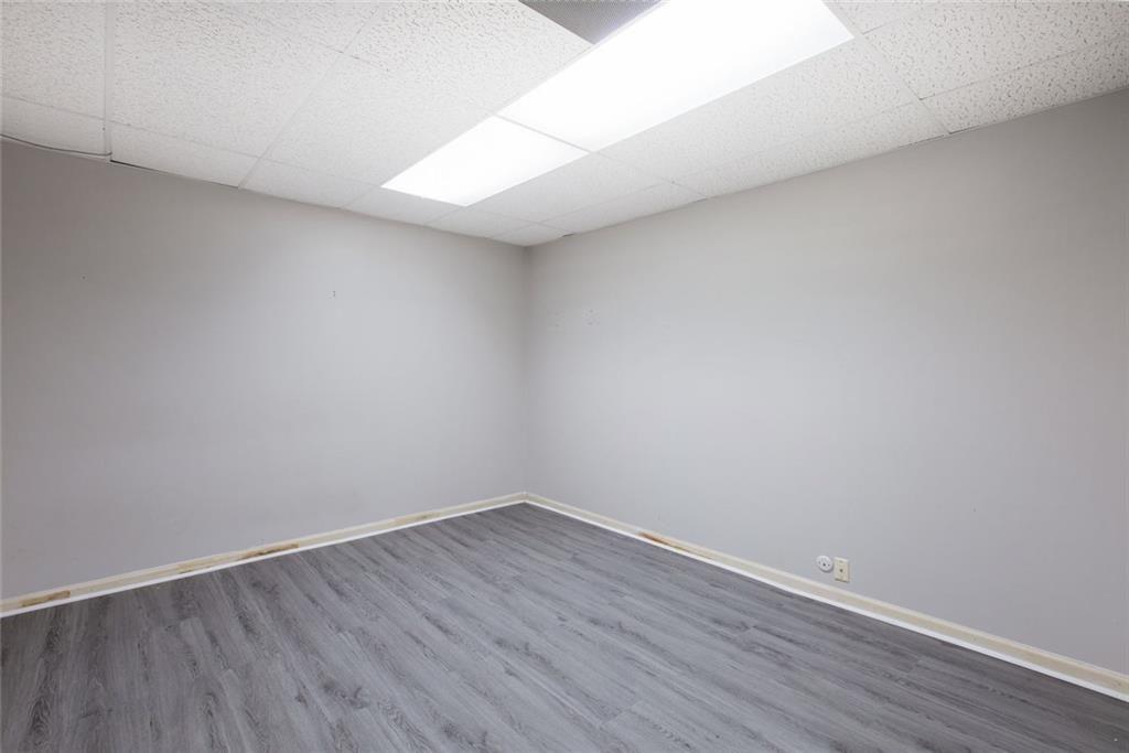 6464 Westerly Way Douglasville, GA 30135 - Photo 24 of 40 a view of an empty room with wooden floor