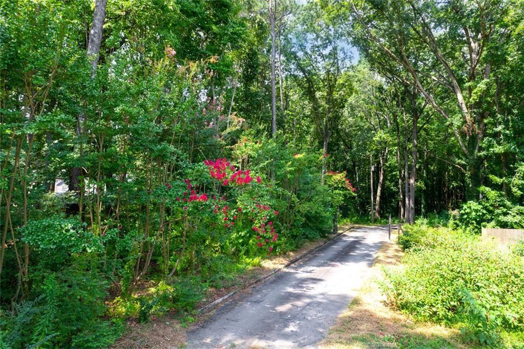 6464 Westerly Way Douglasville, GA 30135 - Photo 38 of 40 a view of a pathway with a tree