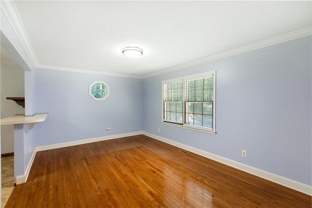 6464 Westerly Way Douglasville, GA 30135 - Photo 6 of 40 an empty room with a window