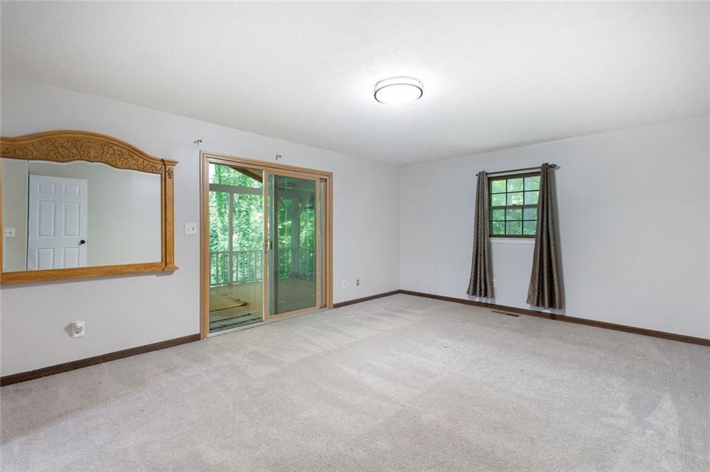 6464 Westerly Way Douglasville, GA 30135 - Photo 10 of 40 an empty room with windows