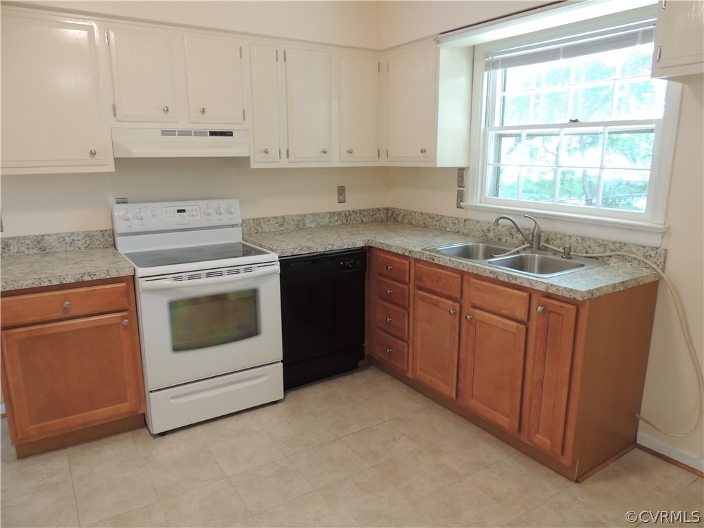 1555 Robindale Road Richmond, VA 23235 - Photo 6 of 17 Kitchen with new tile floor, counter top, dishwash